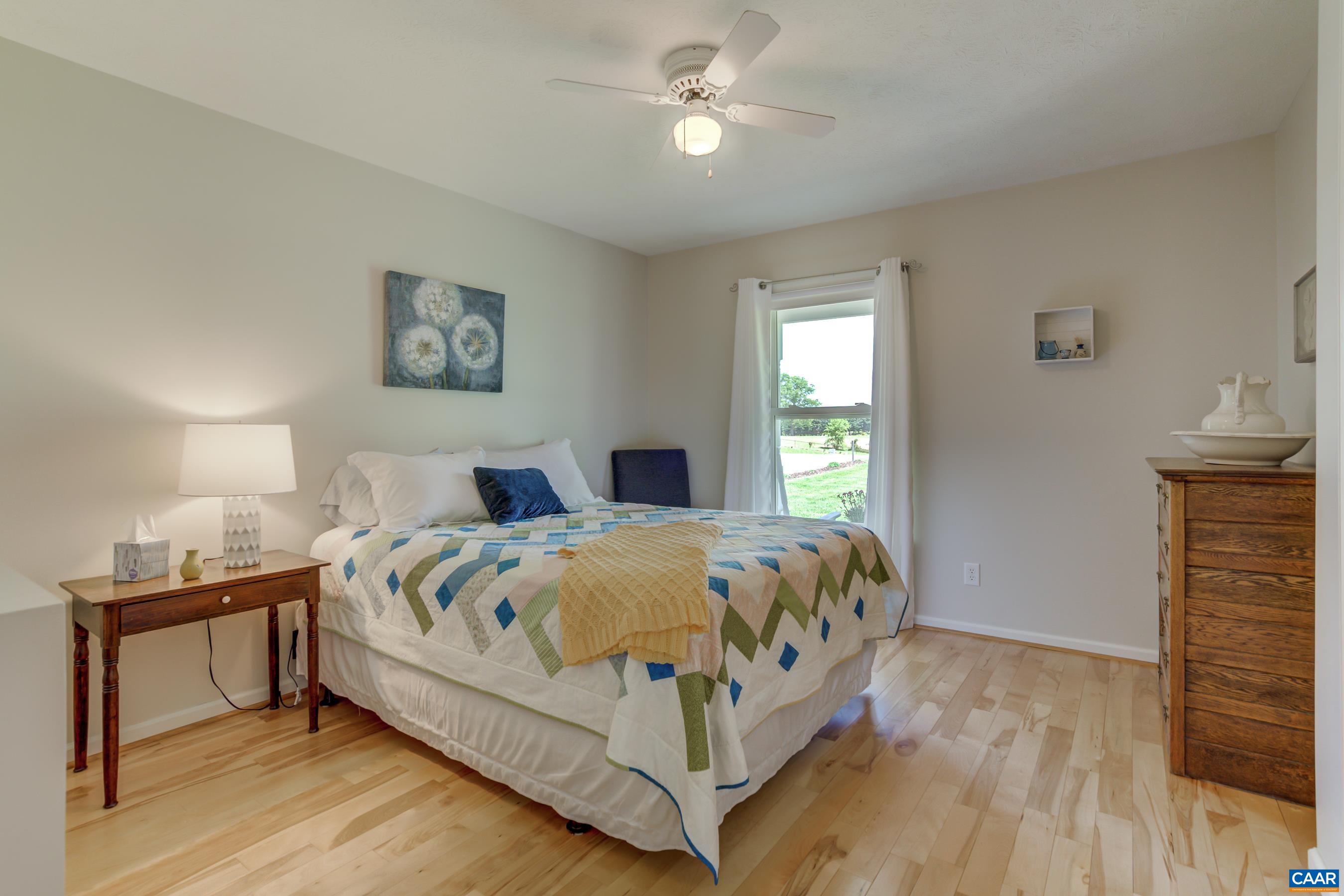 120 Meadowview Lane Ruckersville, VA 22968 - Photo 25 of 53 a bedroom with a bed and a window