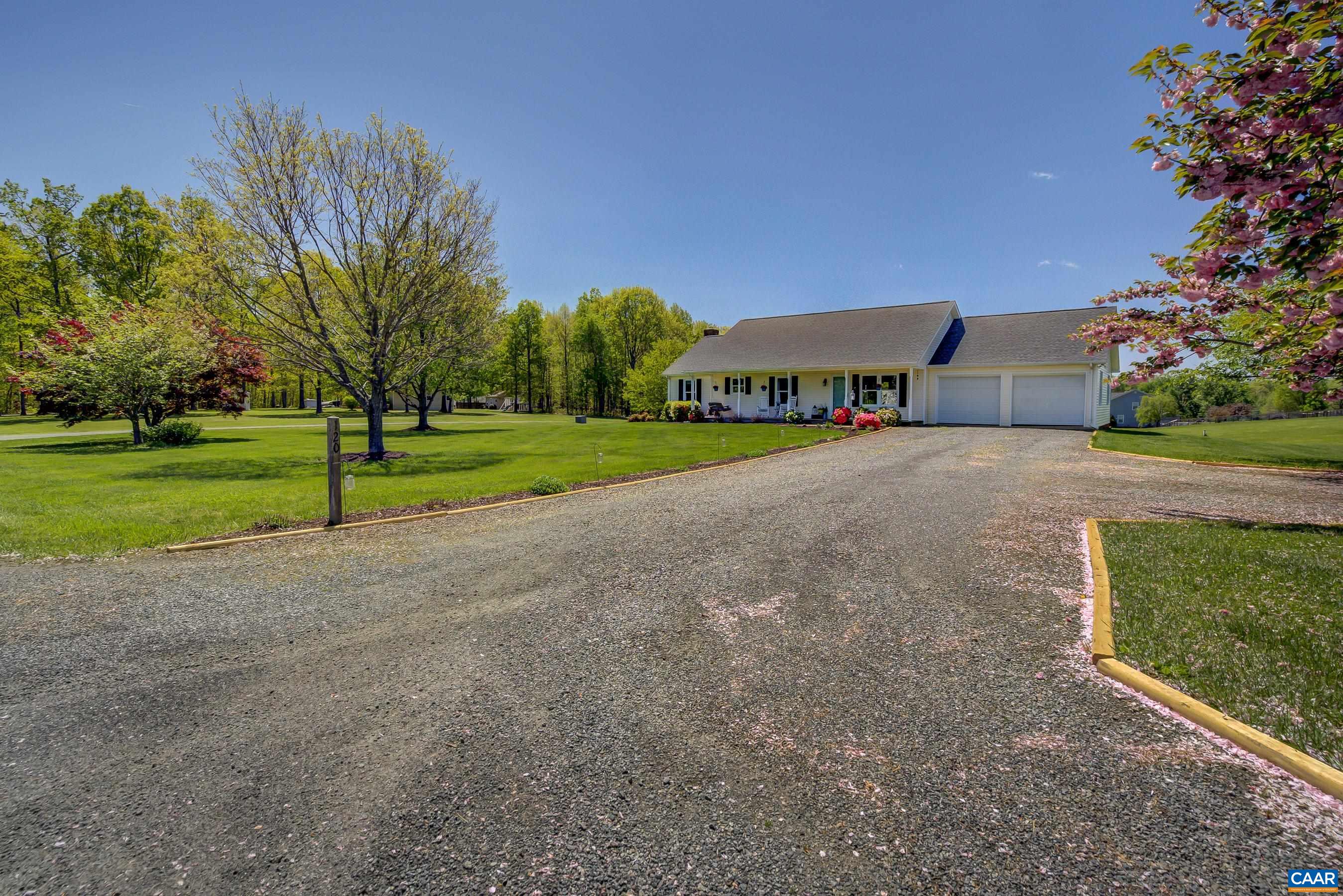 120 Meadowview Lane Ruckersville, VA 22968 - Photo 44 of 53 a view of a house with a yard and a large tree