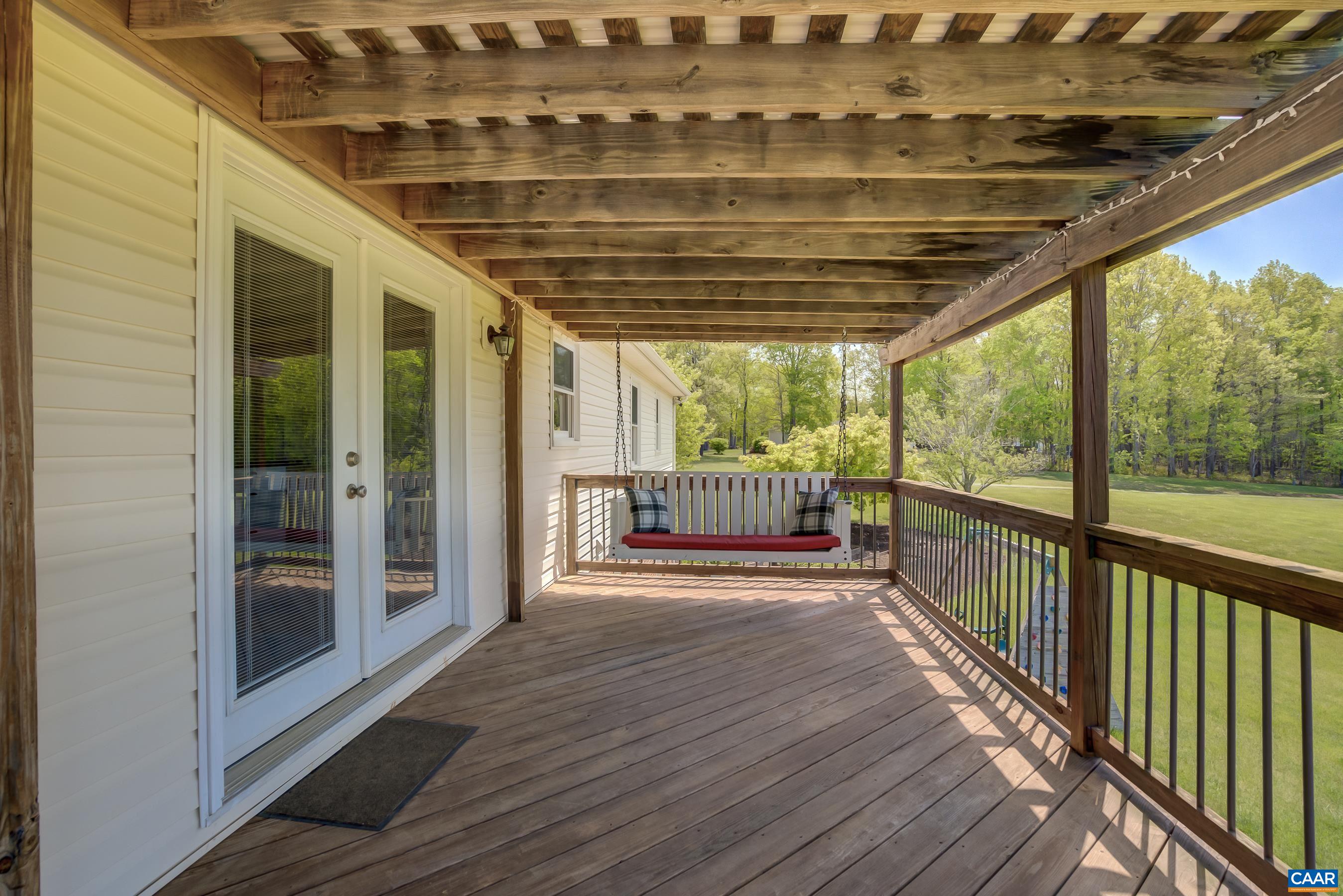 120 Meadowview Lane Ruckersville, VA 22968 - Photo 46 of 53 a view of a porch with wooden floor