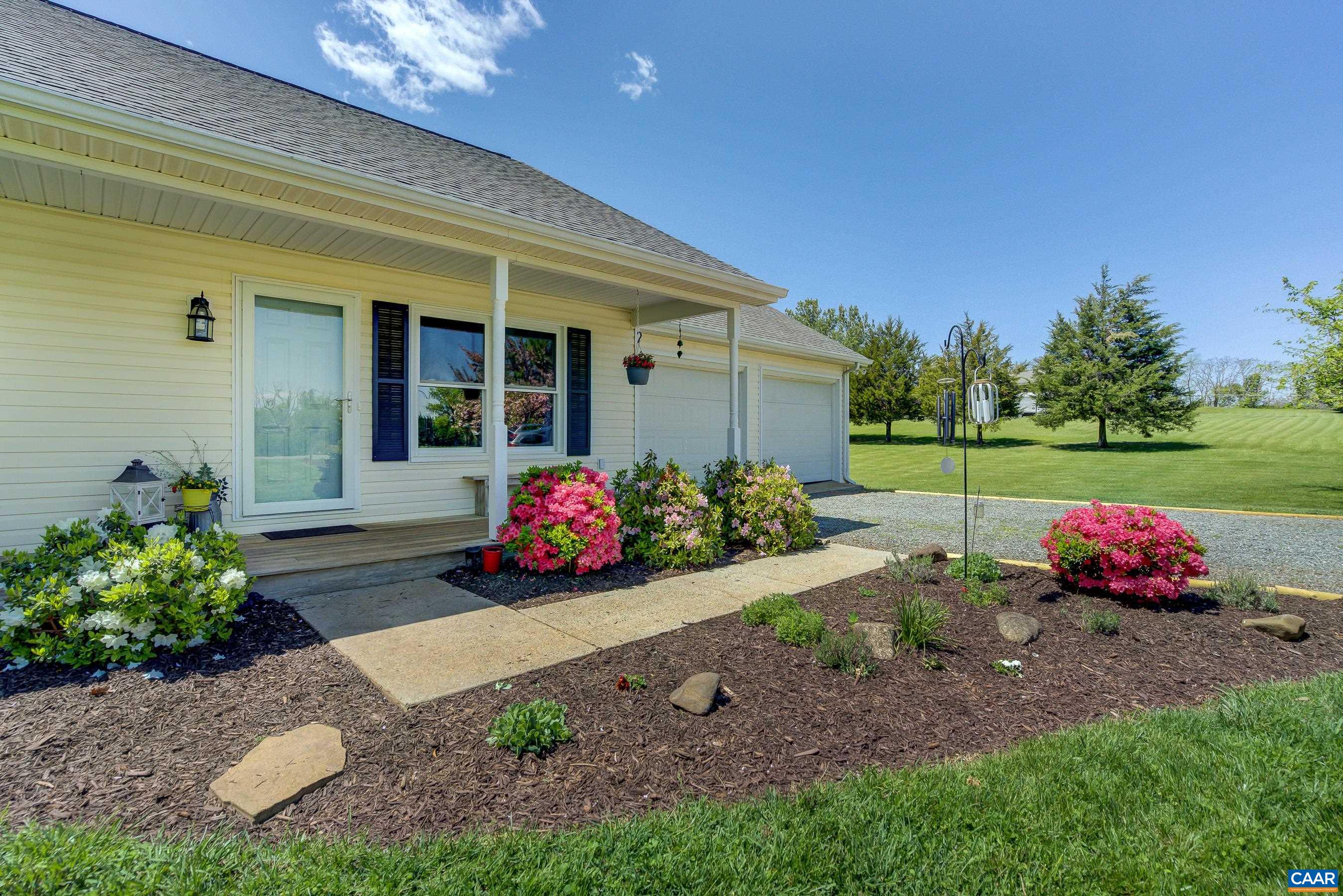 120 Meadowview Lane Ruckersville, VA 22968 - Photo 5 of 53 a view of a house with a garden