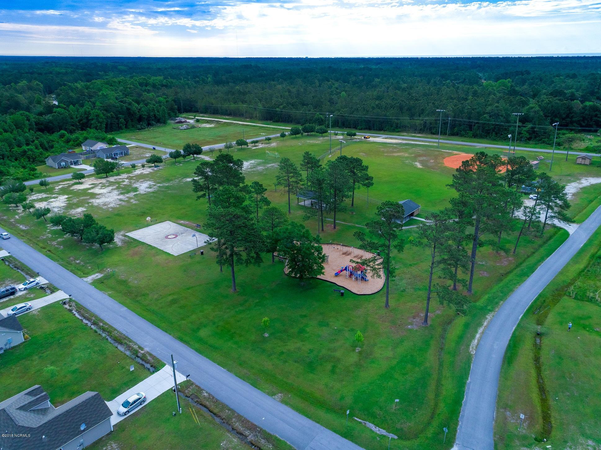 577 Morris Landing Road, Unit 26 Holly Ridge, NC 28445 - Photo 25 of 28 HOLLY LIFESTYLE-3