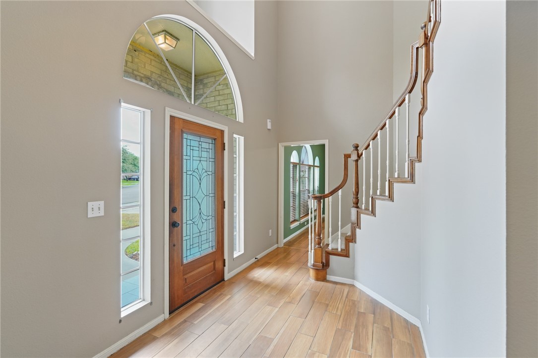 7617 Del Rio Drive Corpus Christi, TX 78413 - Photo 2 of 32 a view of entryway and hall with wooden floor