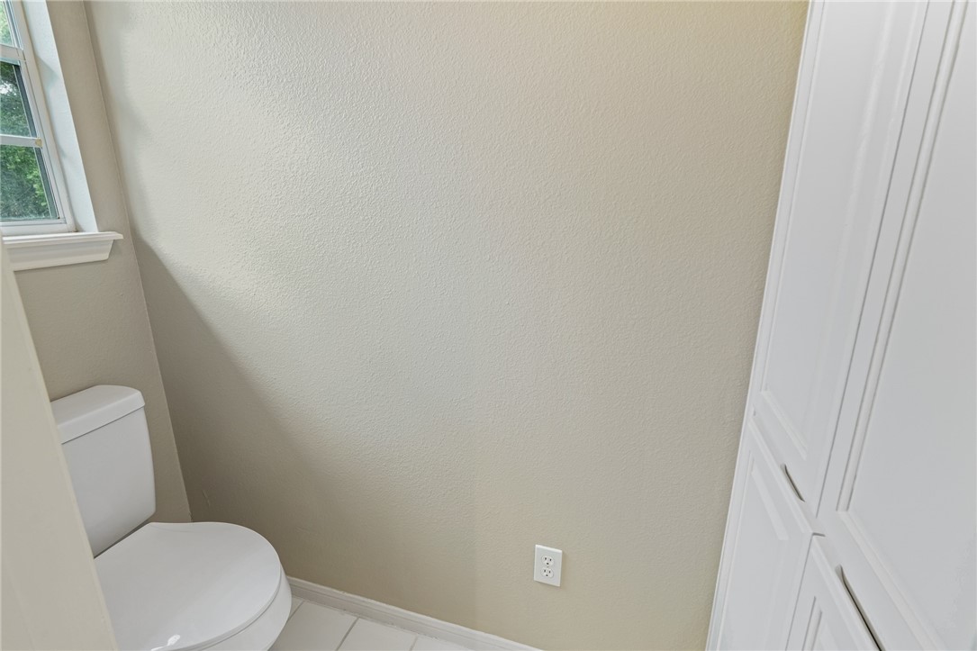 7617 Del Rio Drive Corpus Christi, TX 78413 - Photo 25 of 32 a white toilet sitting next to a window