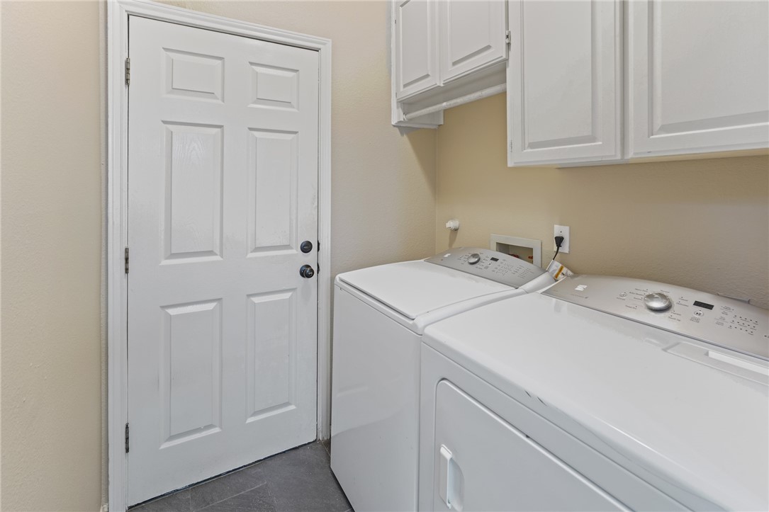 7617 Del Rio Drive Corpus Christi, TX 78413 - Photo 27 of 32 a utility room with dryer and washer