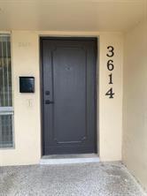 3614 Taylor Street Hollywood, FL 33021 - Photo 6 of 20 an empty room with windows