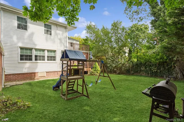 a view of a patio with wooden floor