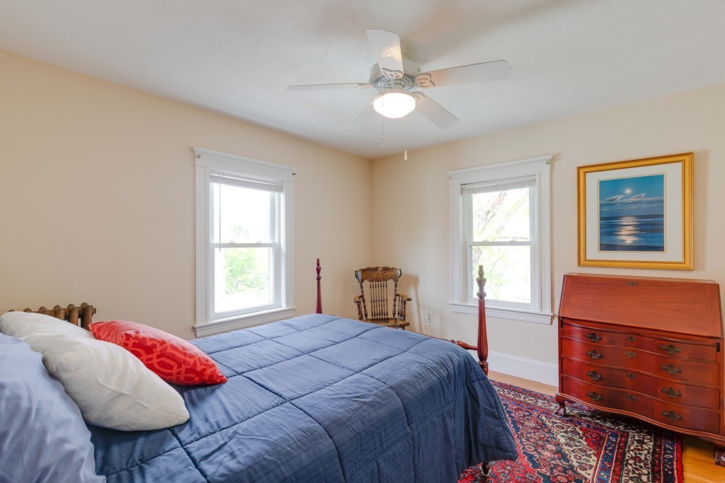 4 Hilltop Road Watertown, MA 02472 - Photo 16 of 27 a bedroom with a bed and a window