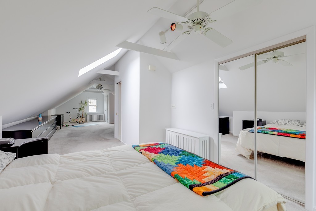 4 Hilltop Road Watertown, MA 02472 - Photo 22 of 27 a bedroom with furniture and window