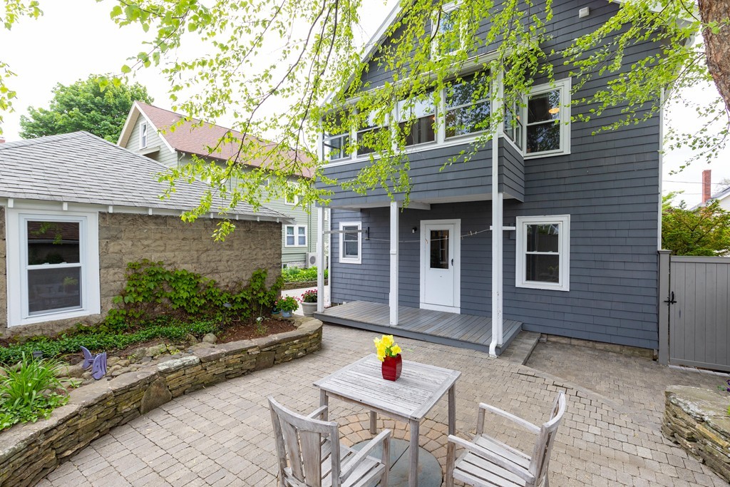 4 Hilltop Road Watertown, MA 02472 - Photo 26 of 27 a view of house with outdoor seating space