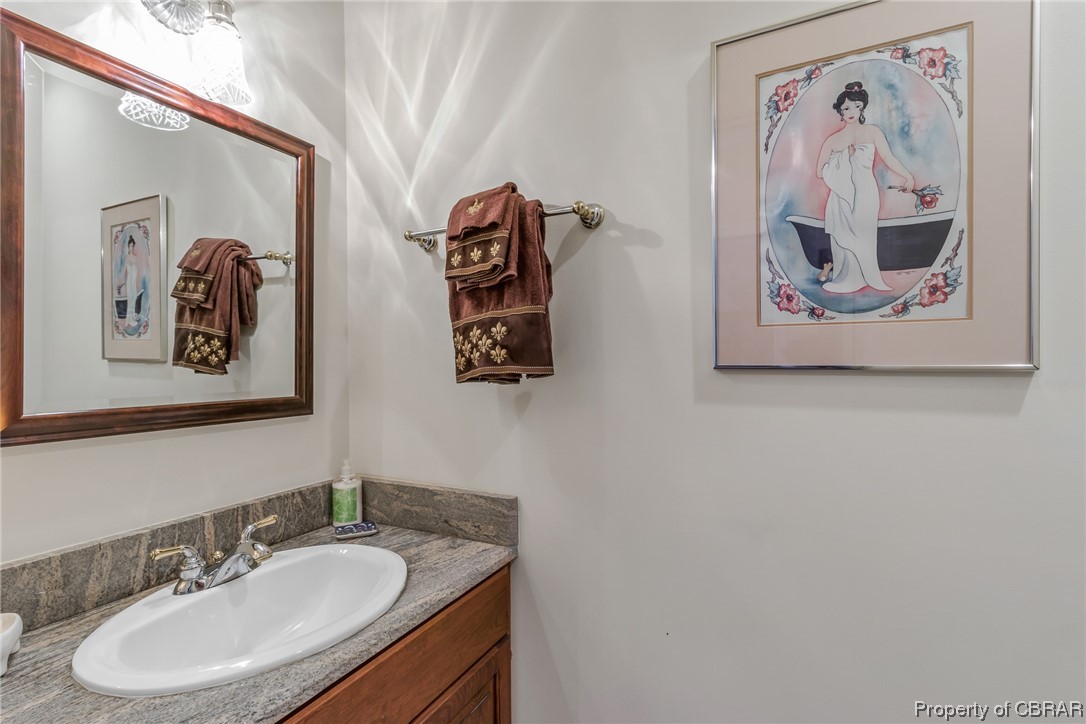 181 Duckbill Road White Stone, VA 22578 - Photo 42 of 50 Bathroom featuring mirror and vanity
