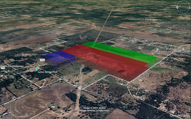 a view of a backyard with water fountain