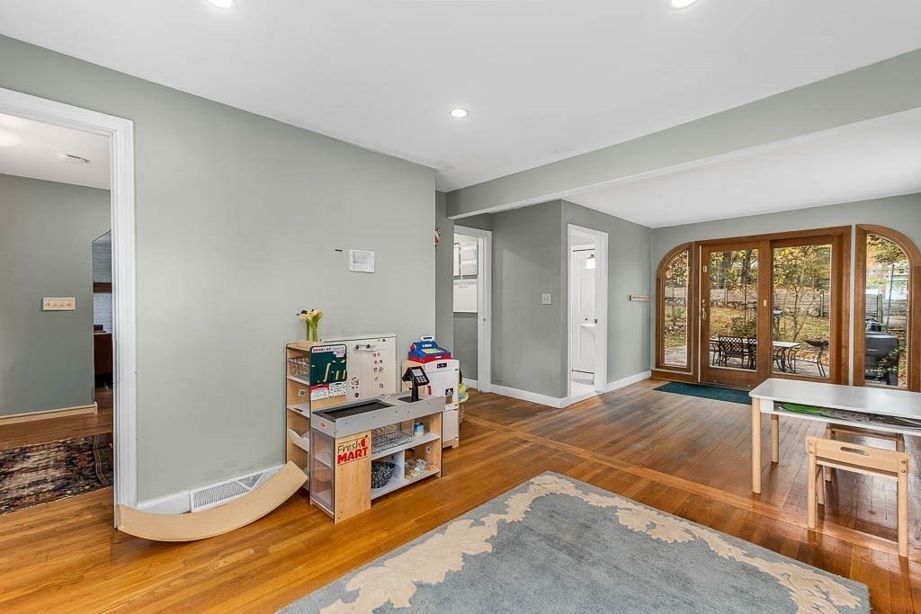 34 Cranberry Lane Dedham, MA 02026 - Photo 11 of 38 a living room with furniture and large windows