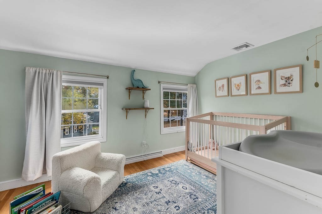 34 Cranberry Lane Dedham, MA 02026 - Photo 18 of 38 a living room with furniture and a window
