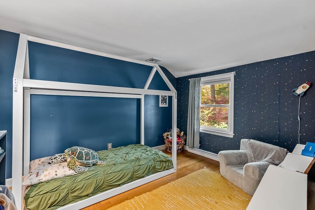 34 Cranberry Lane Dedham, MA 02026 - Photo 22 of 38 a bedroom with a bed and a window