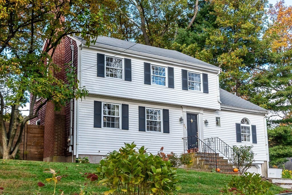 34 Cranberry Lane Dedham, MA 02026 - Photo 3 of 38 a house that has a tree in front of the house