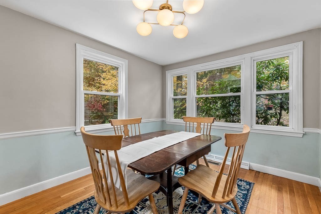 34 Cranberry Lane Dedham, MA 02026 - Photo 8 of 38 a view of a dining room with furniture window and outside view
