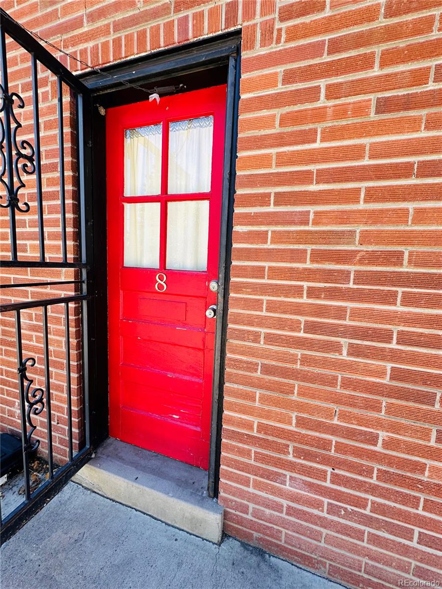 1400 South Clermont Street, Unit 8 Denver, CO 80222 - Photo 2 of 11 a view of outdoor space and barbecue grill