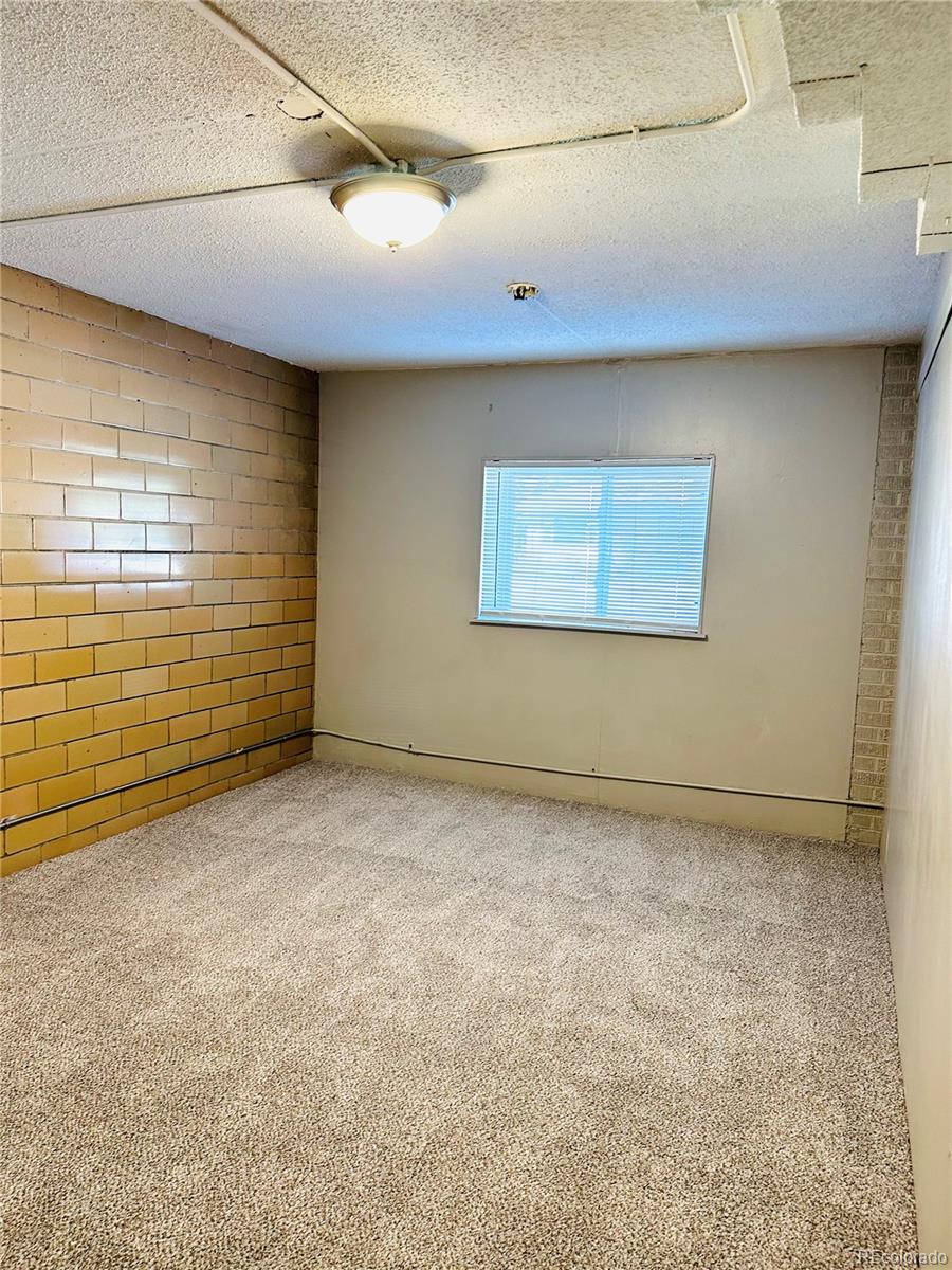 1400 South Clermont Street, Unit 8 Denver, CO 80222 - Photo 5 of 11 a view of an empty room