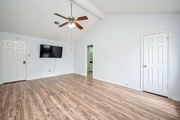 a view of a livingroom with a flat screen tv