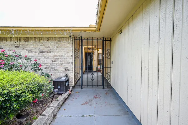 a view of balcony with furniture