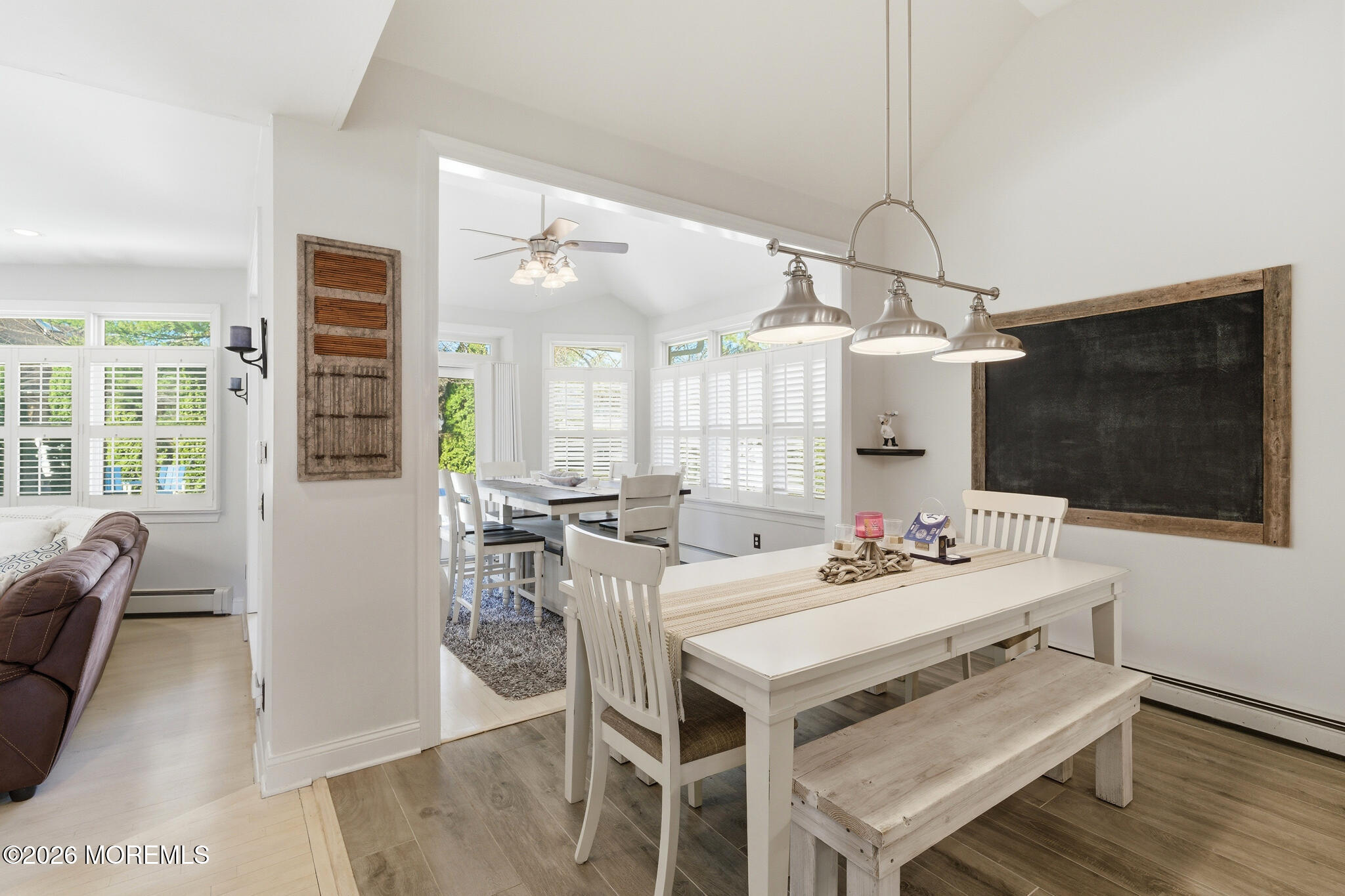718 Amherst Road Lanoka Harbor, NJ 08734 - Photo 28 of 66 a view of a dining room with furniture wooden floor and chandelier