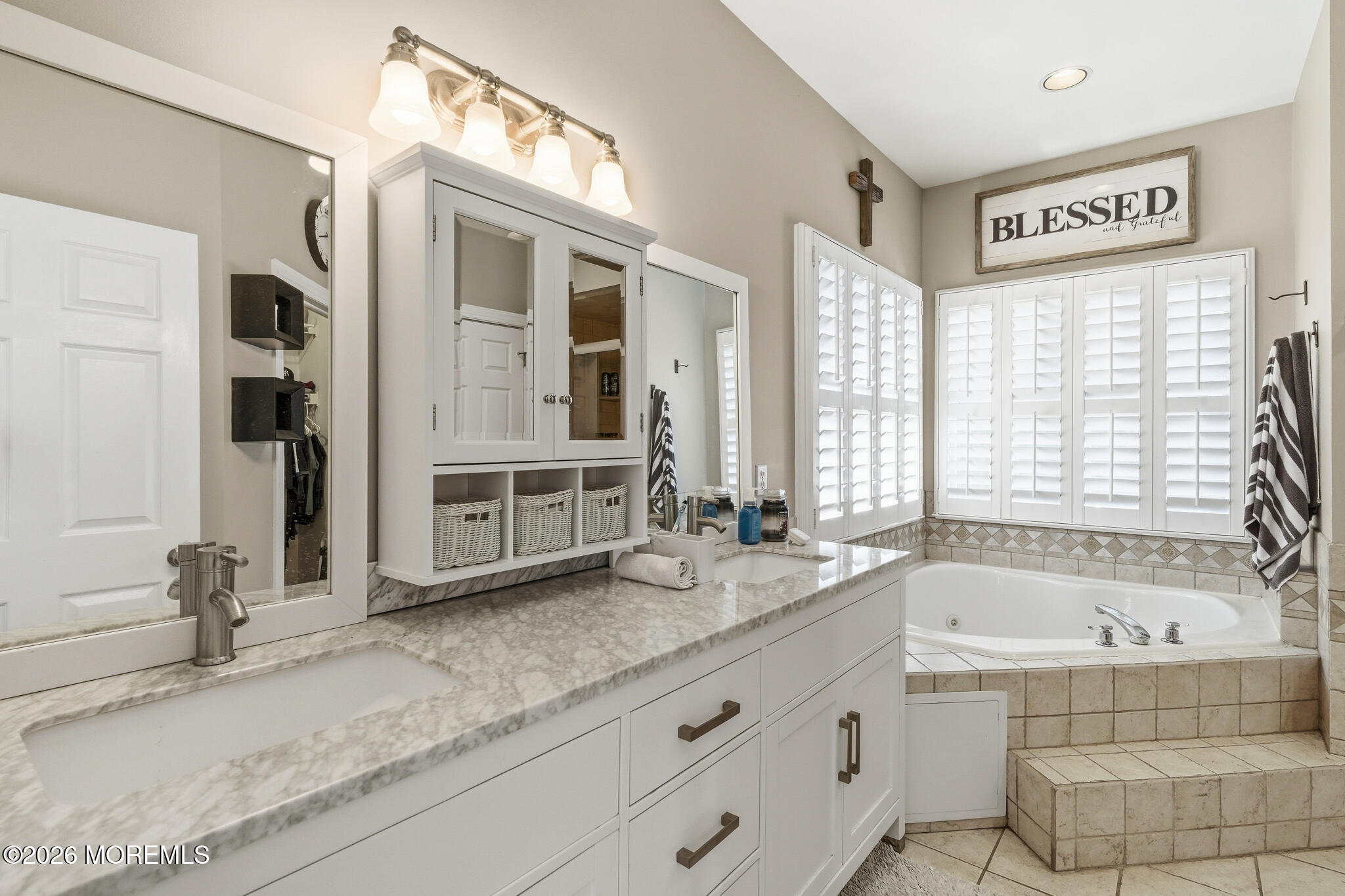 718 Amherst Road Lanoka Harbor, NJ 08734 - Photo 38 of 66 a bathroom with a granite countertop sink and a bathtub