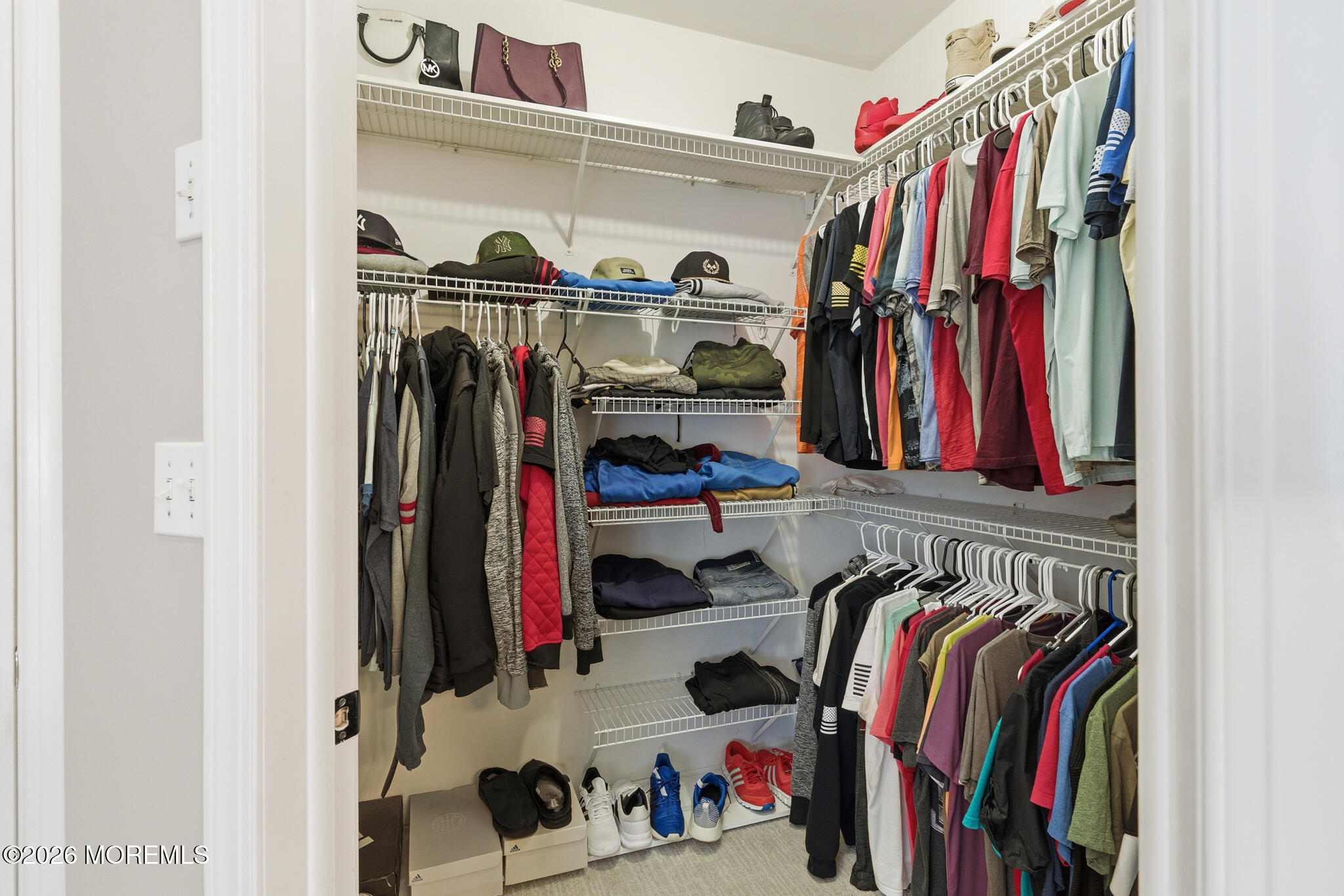 718 Amherst Road Lanoka Harbor, NJ 08734 - Photo 41 of 66 a view of walk in closet with clothes and shoes