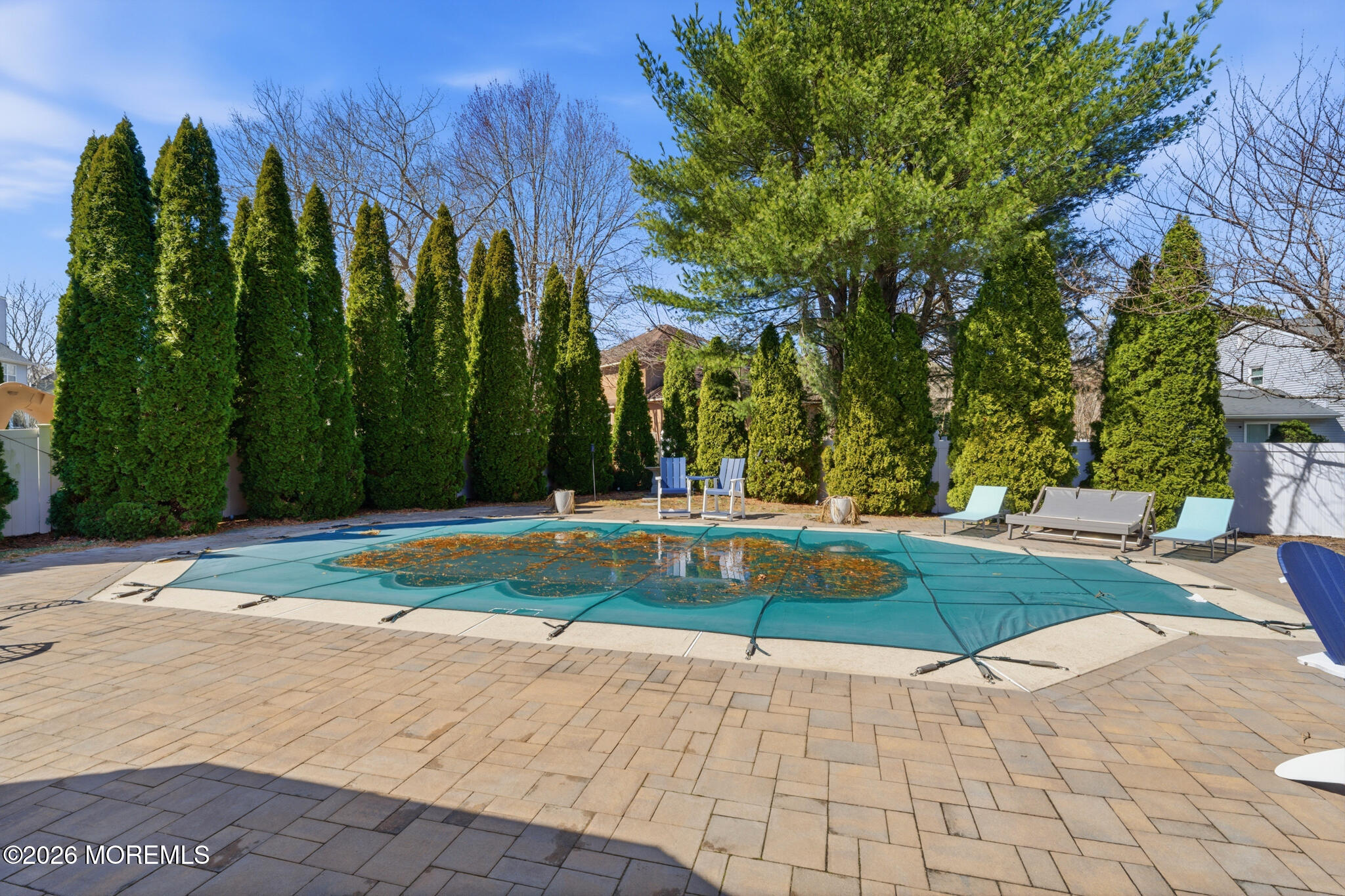 718 Amherst Road Lanoka Harbor, NJ 08734 - Photo 48 of 66 a view of backyard with swimming pool and seating space