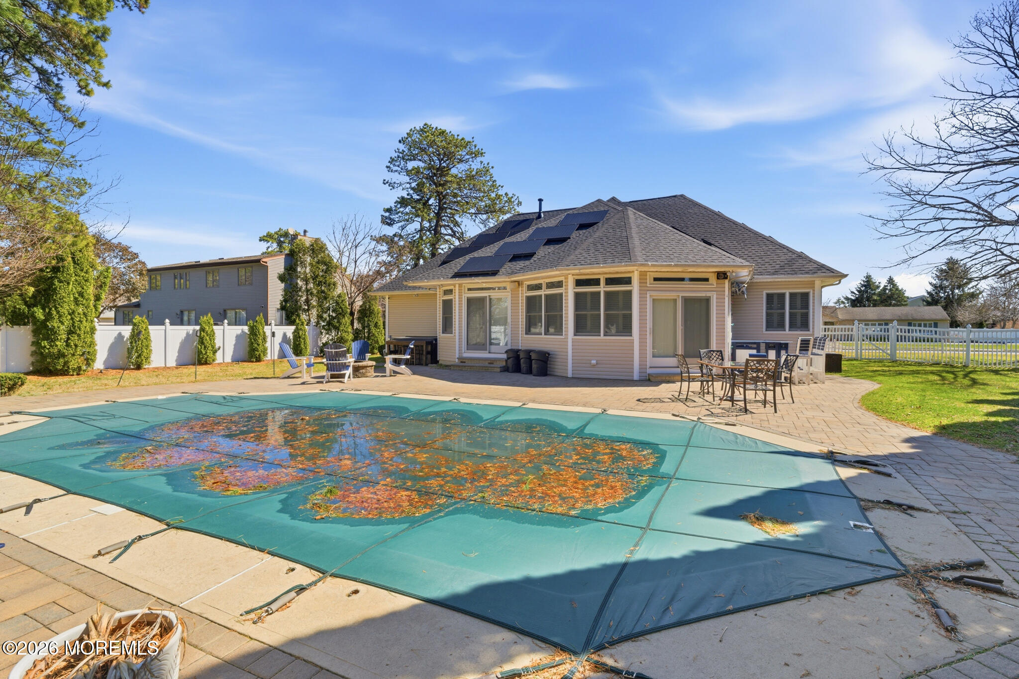 718 Amherst Road Lanoka Harbor, NJ 08734 - Photo 51 of 66 a view of a house with swimming pool and a yard