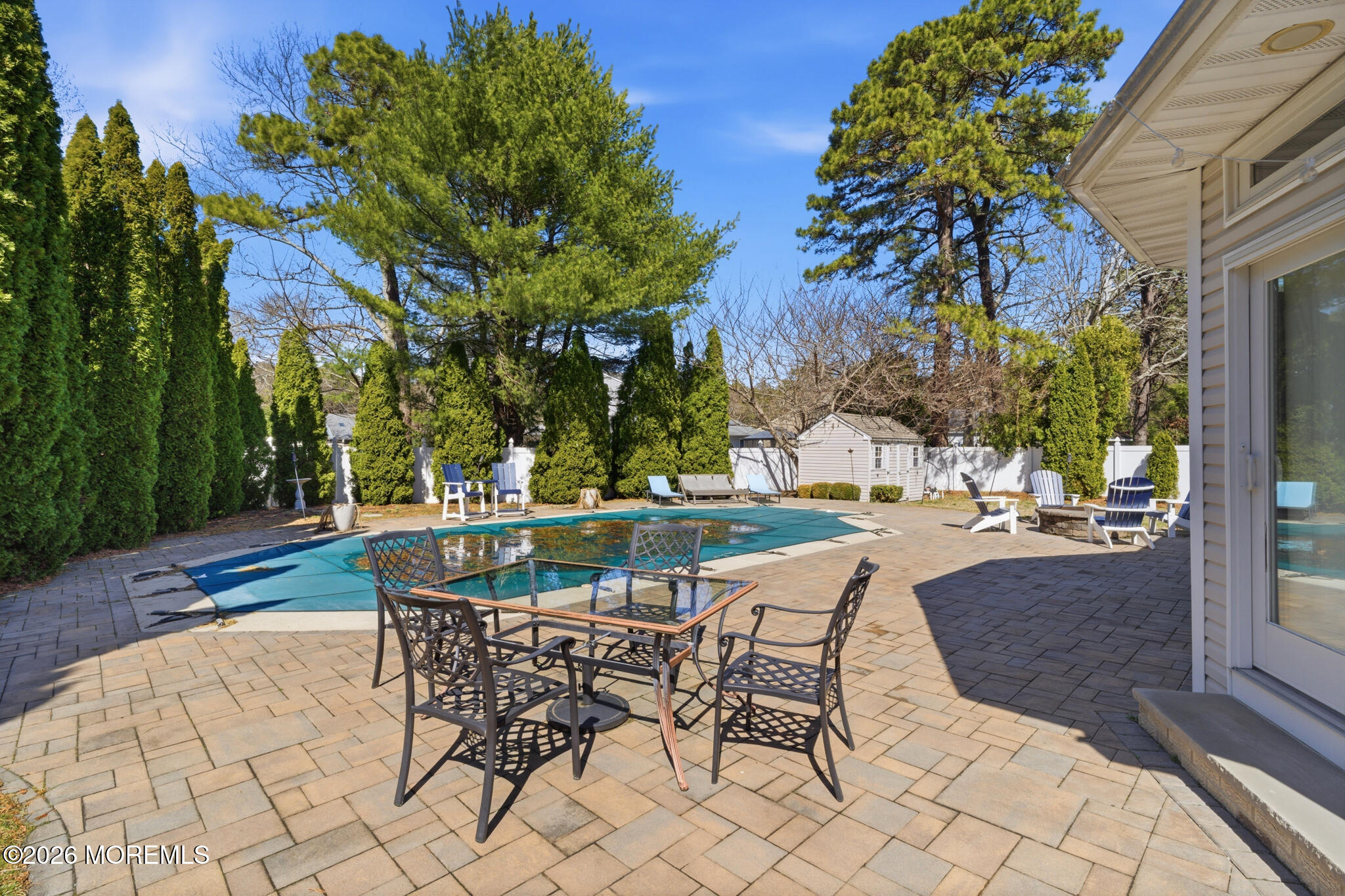 718 Amherst Road Lanoka Harbor, NJ 08734 - Photo 54 of 66 a view of a chairs and tables in the patio