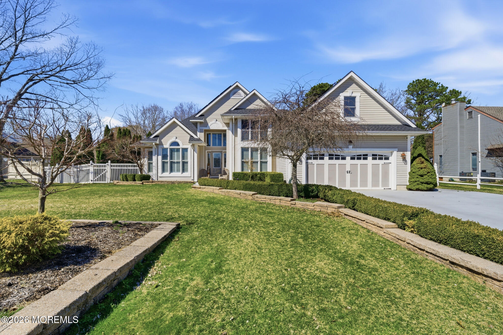 718 Amherst Road Lanoka Harbor, NJ 08734 - Photo 7 of 66 a front view of a house with a yard