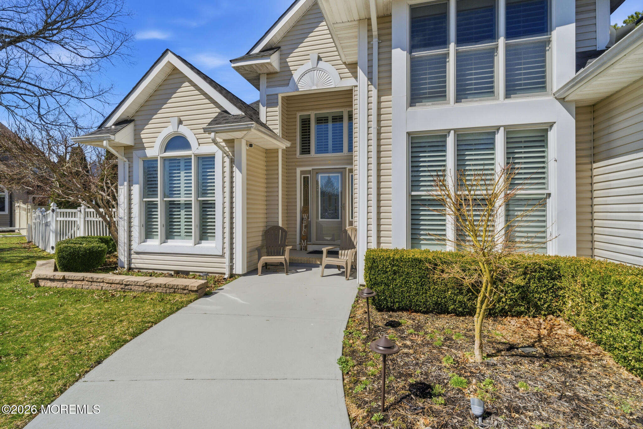 718 Amherst Road Lanoka Harbor, NJ 08734 - Photo 10 of 66 a front view of a house with a yard