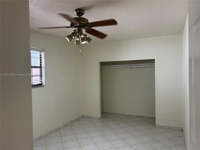 a bathroom with a toilet a sink and bathtub