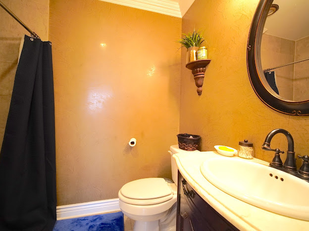 5744 106th Street, Unit 3C Chicago Ridge, IL 60415 - Photo 15 of 19 a bathroom with a sink and a mirror