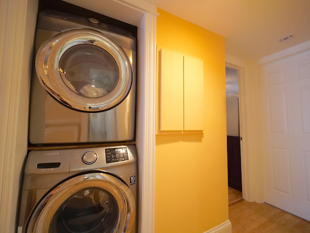 5744 106th Street, Unit 3C Chicago Ridge, IL 60415 - Photo 17 of 19 a view of a storage & utility room with washer and dryer