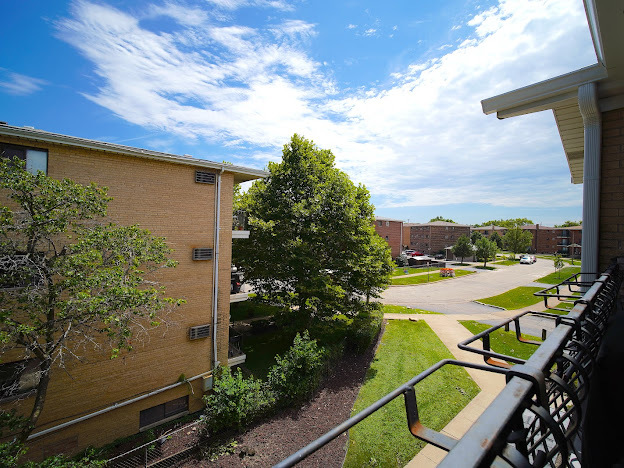 5744 106th Street, Unit 3C Chicago Ridge, IL 60415 - Photo 19 of 19 a view of a patio with swimming pool and sitting area