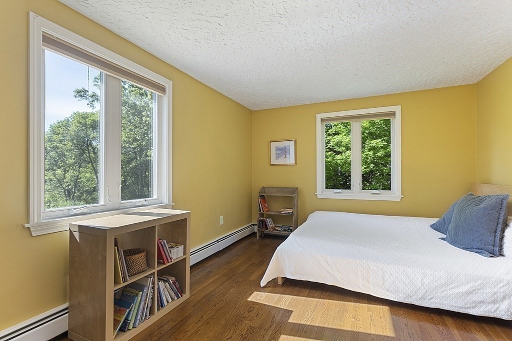 208 Concord Road Lincoln, MA 01773 - Photo 14 of 23 a bedroom with a bed and a window