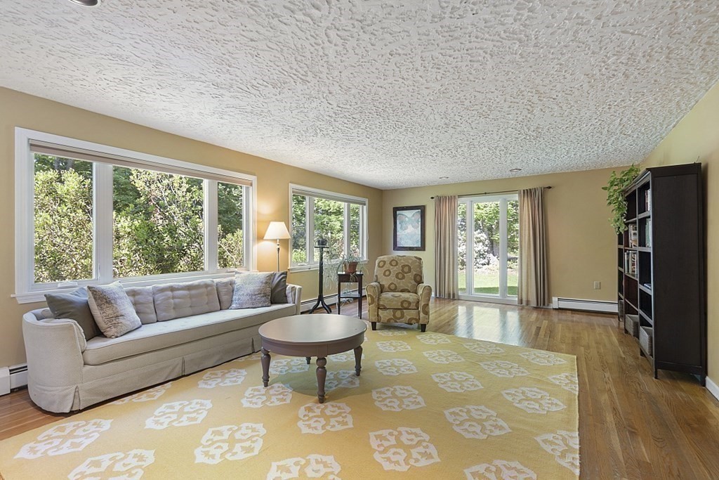 208 Concord Road Lincoln, MA 01773 - Photo 7 of 23 a living room with furniture and a window