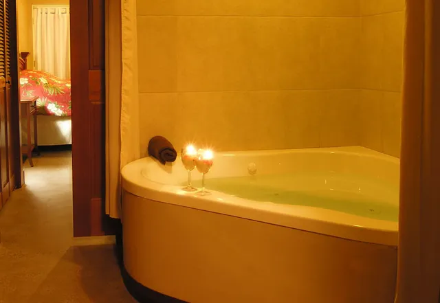 a view of two chairs in wooden deck