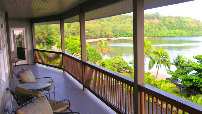 4241 Anini Road Princeville, HI 96722 - Photo 20 of 24 a view of two chairs in wooden deck