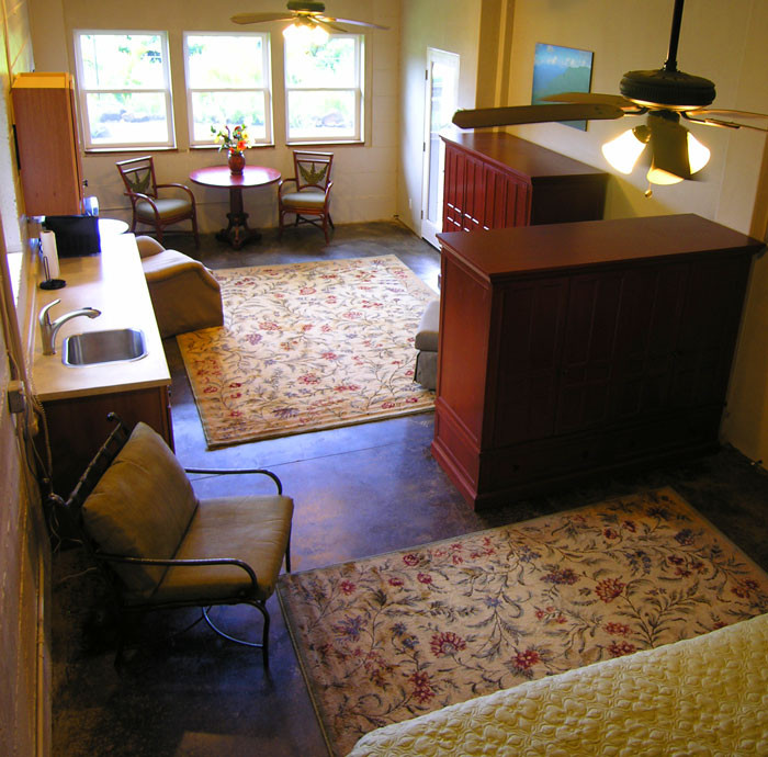 4241 Anini Road Princeville, HI 96722 - Photo 24 of 24 a living room with furniture and a couch