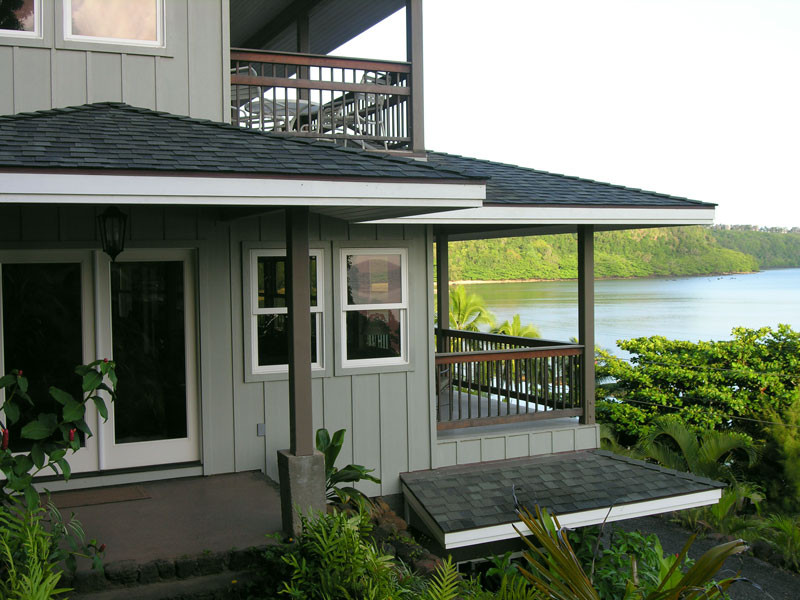 4241 Anini Road Princeville, HI 96722 - Photo 8 of 24 a view of a house with a porch