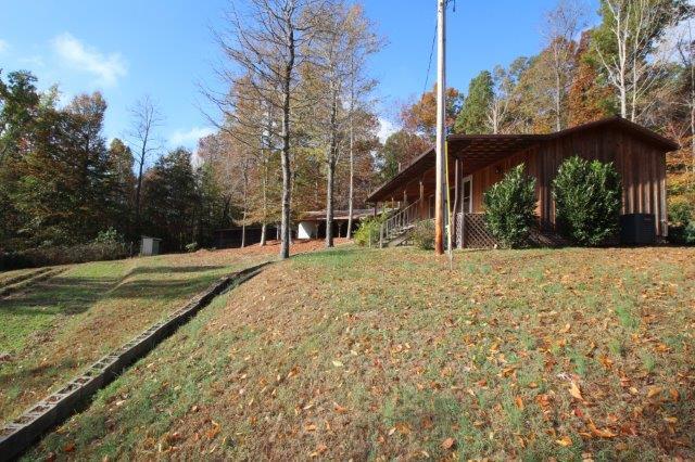 720 Wooten Park Road Red Boiling Springs, TN 37150 - Photo 23 of 29 a view of a house with a yard