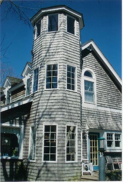 a front view of a house with balcony