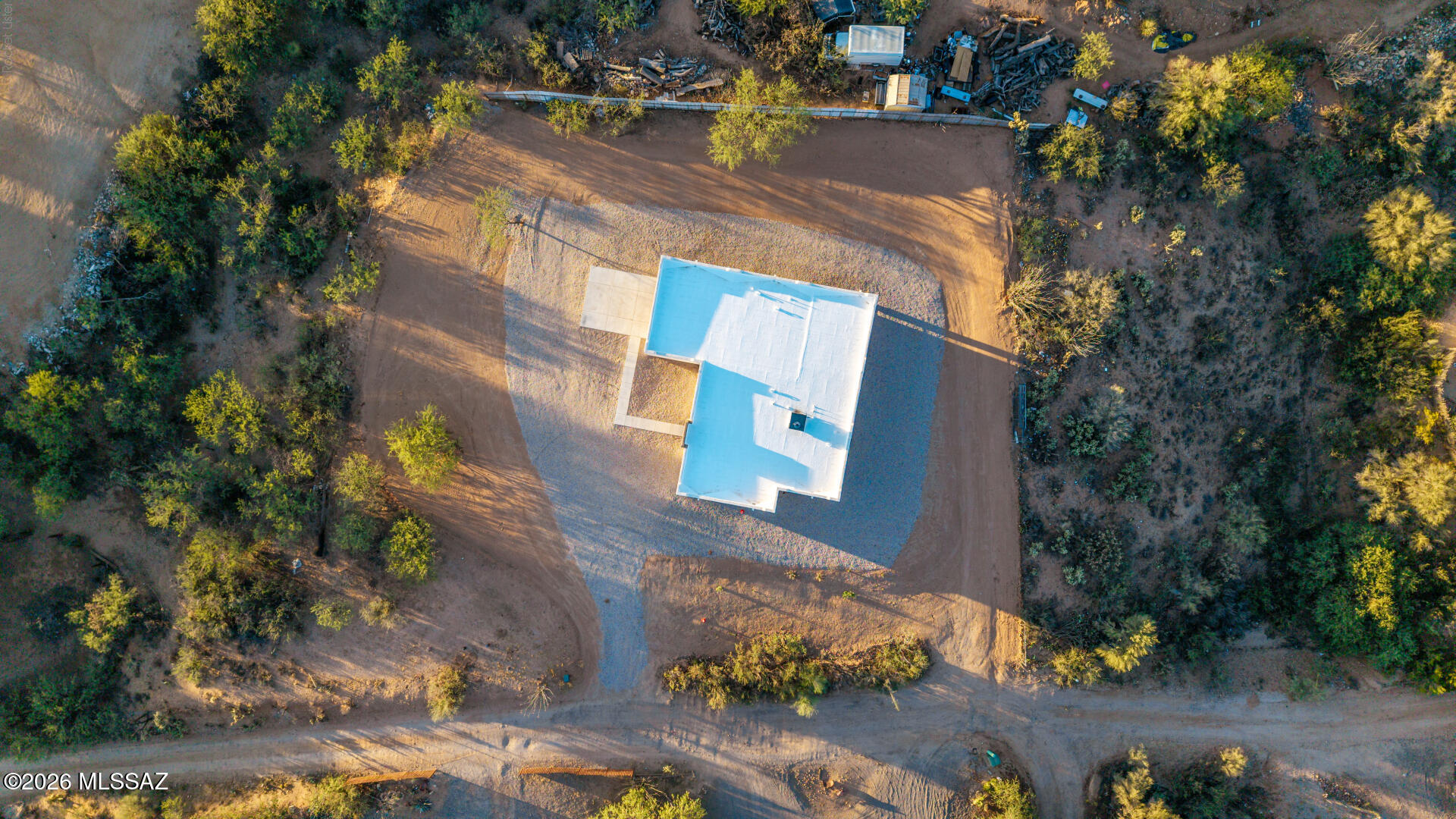 4601 East Magoo Road Tucson, AZ 85739 - Photo 28 of 38 an aerial view of a house with a yard and tree s
