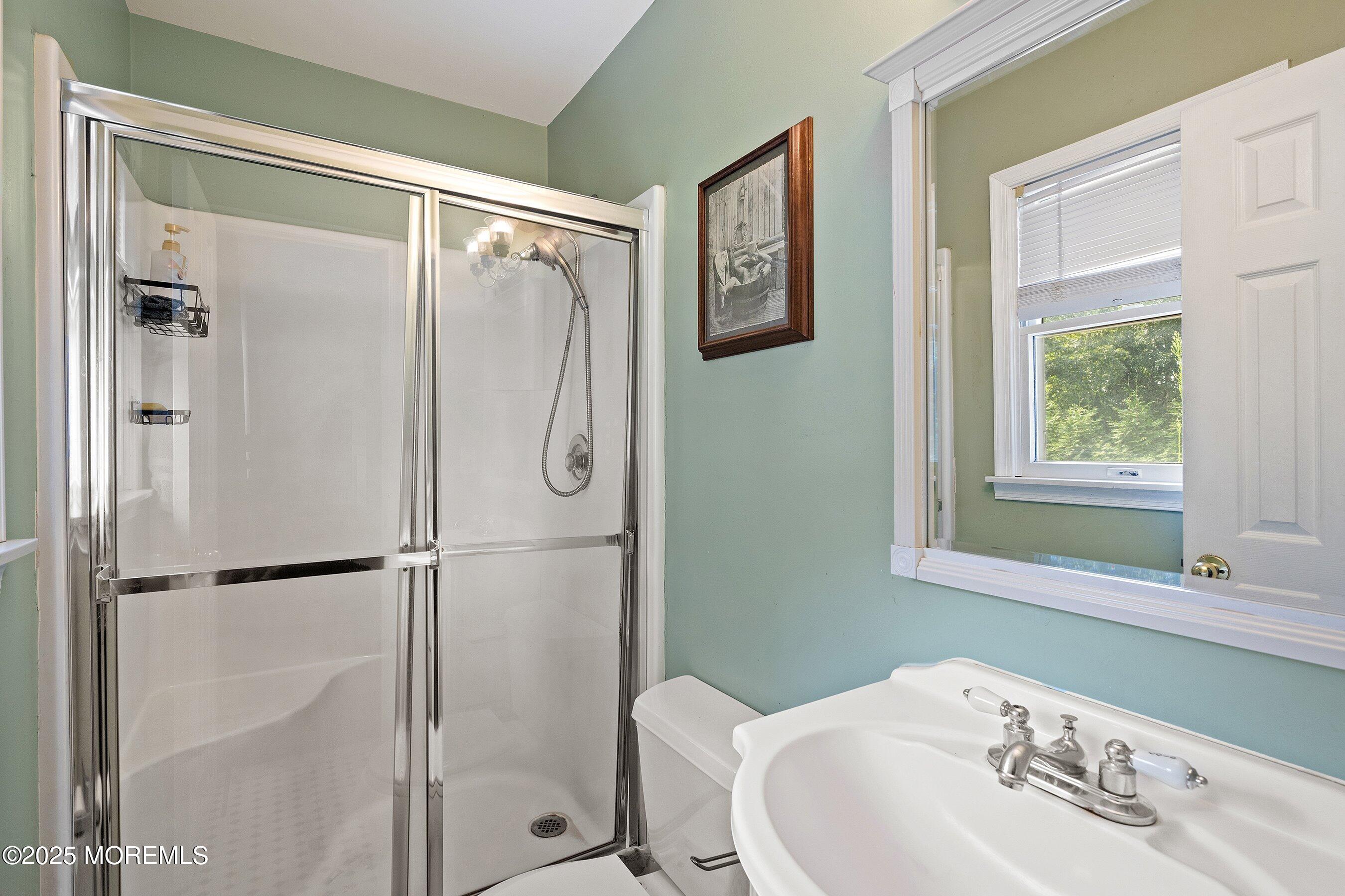 300 Bellanca Road Brick, NJ 08723 - Photo 11 of 23 a bathroom with a sink toilet and shower