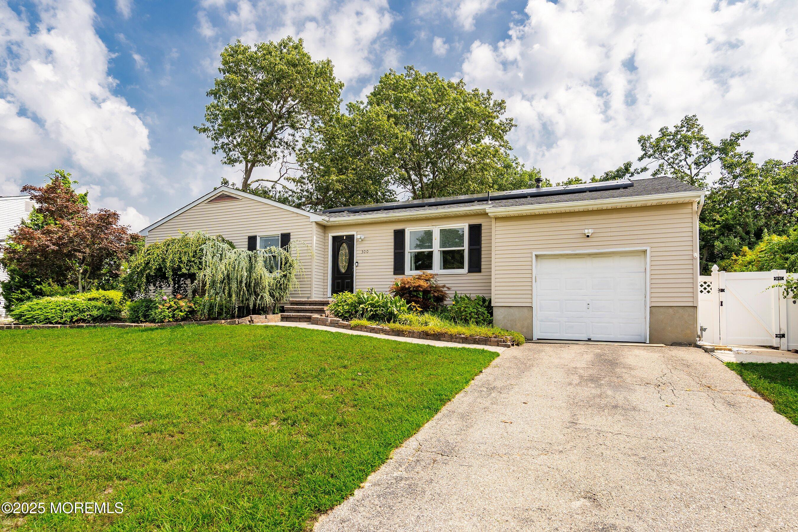 300 Bellanca Road Brick, NJ 08723 - Photo 2 of 23 a front view of a house with garden