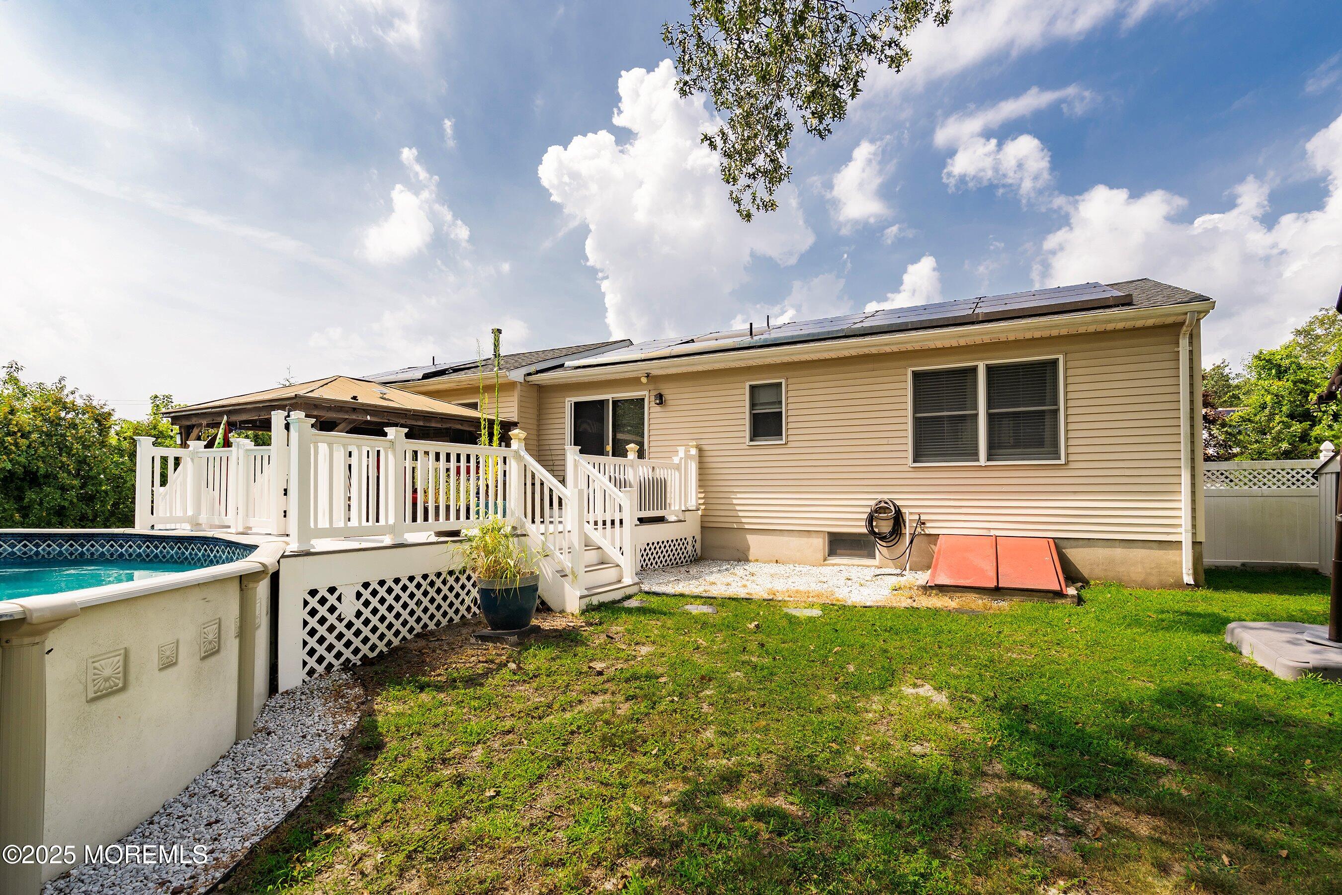 300 Bellanca Road Brick, NJ 08723 - Photo 23 of 23 a view of a house with backyard and sitting area