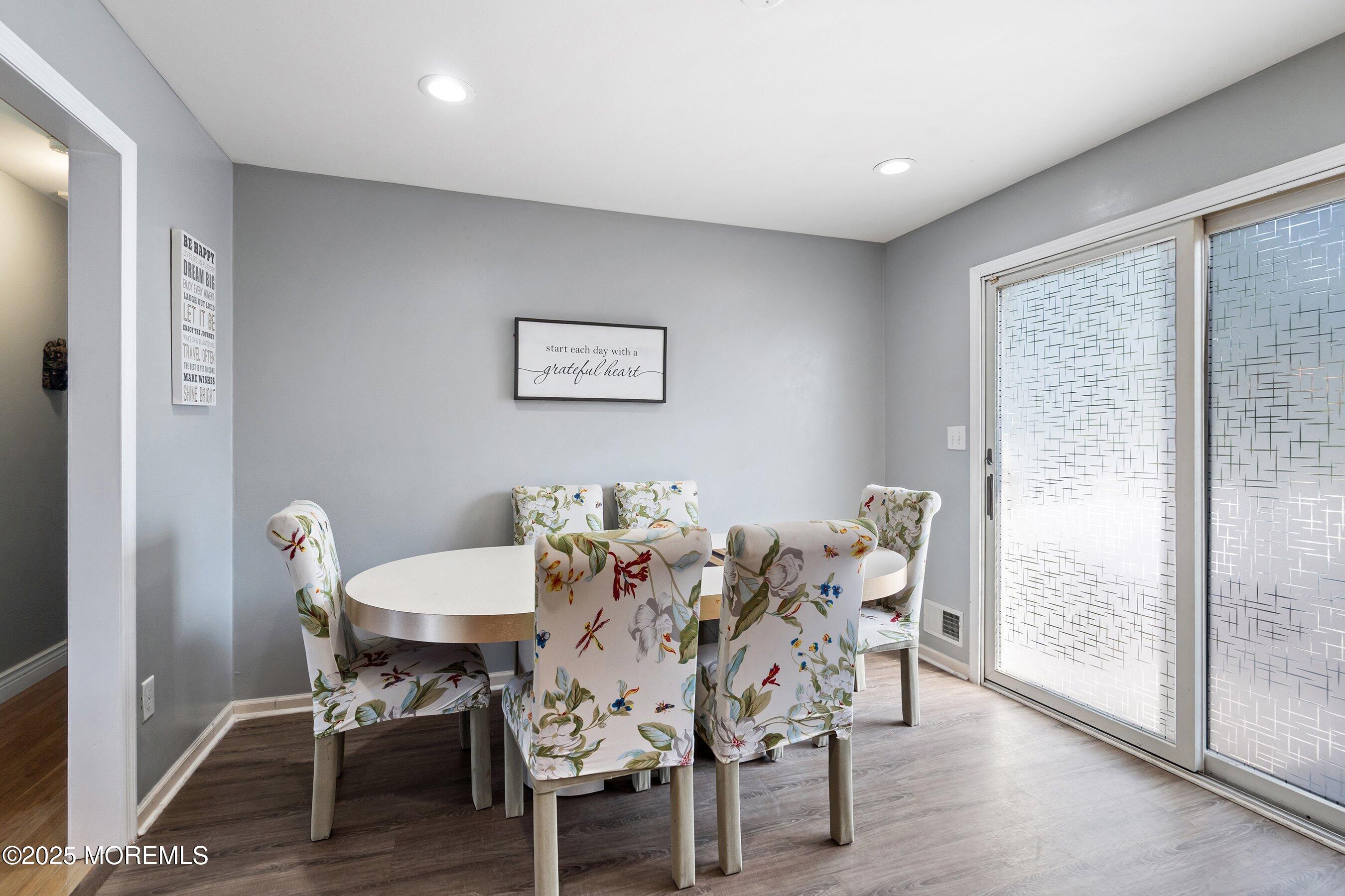 300 Bellanca Road Brick, NJ 08723 - Photo 5 of 23 a view of a dining room with furniture and wooden floor