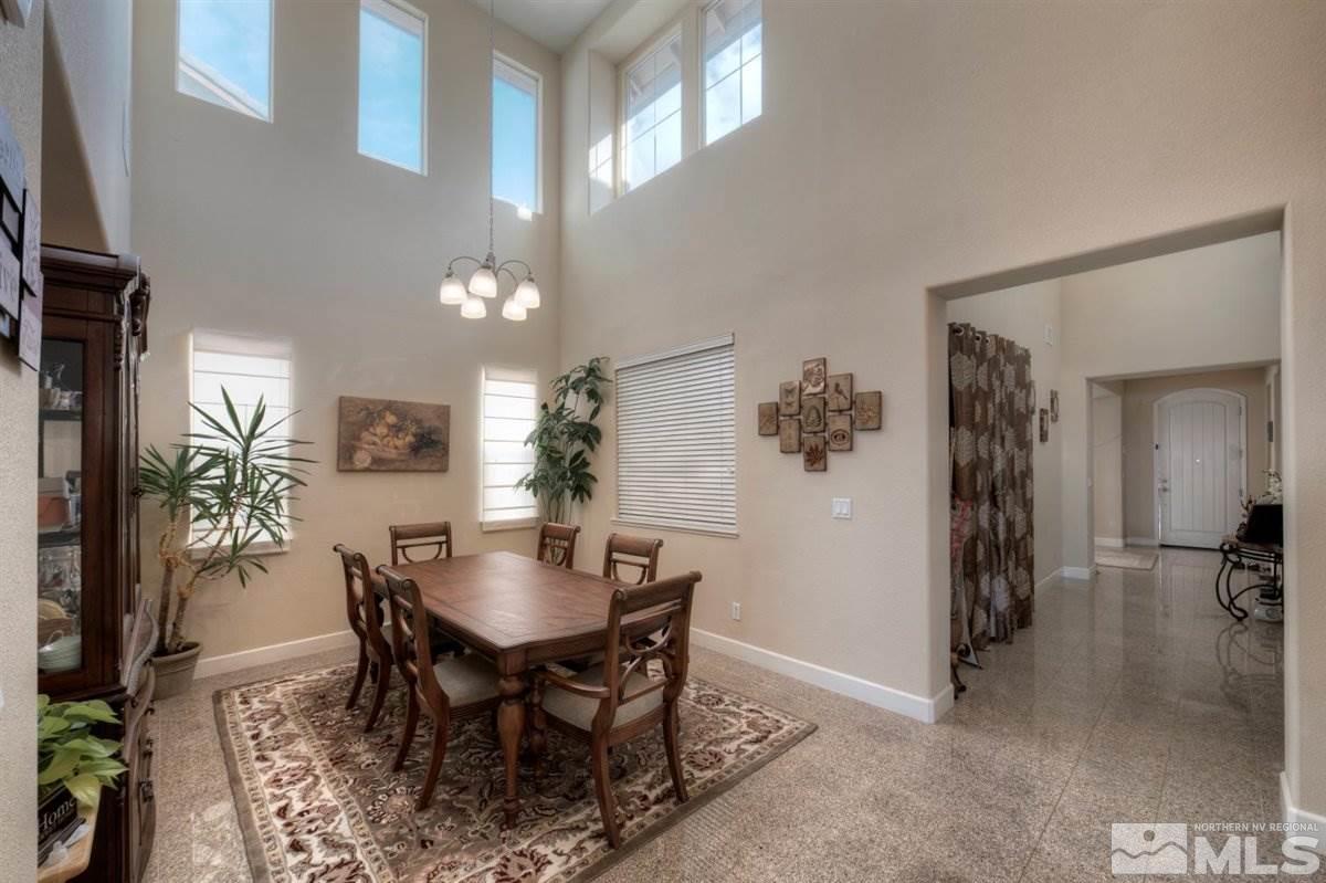 425 Manciano Way Reno, NV 89521 - Photo 11 of 28 a view of a dining room with furniture